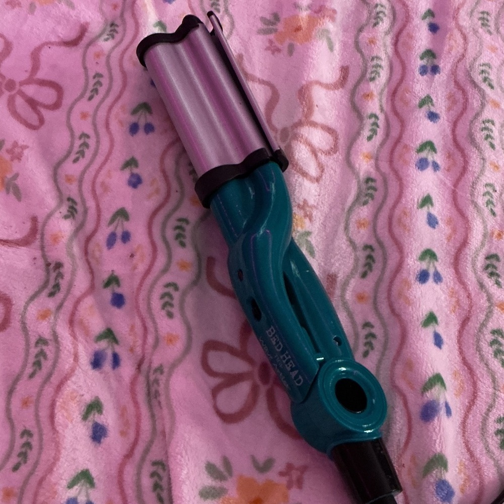 Teal and Silver Hair Styling Tool